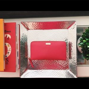 Kate Spade wallet in color coral with gold accents